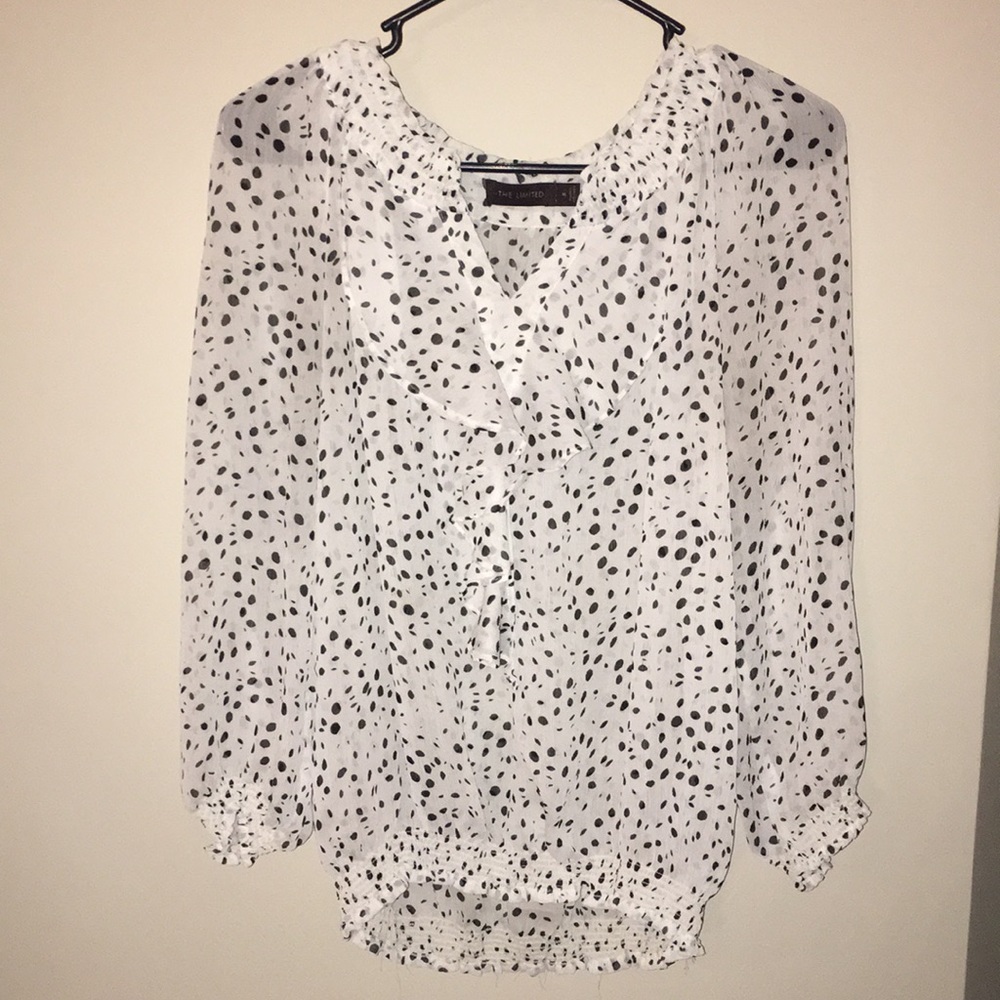 White and black polka-dot blouse